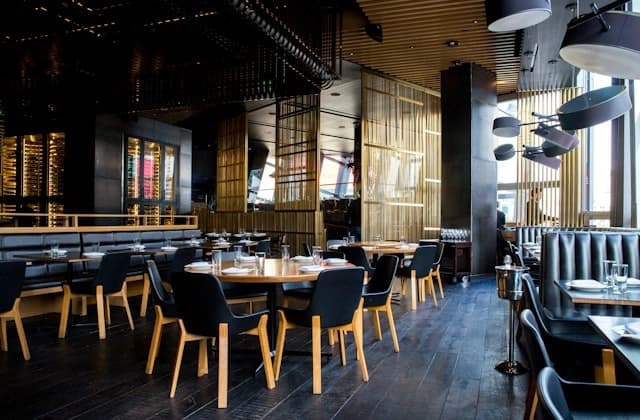 Cozy dine-in restaurant interior with warm lighting